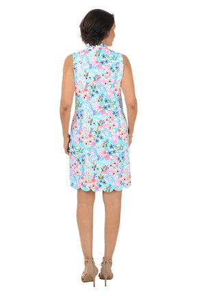 Woman wearing a floral dress on a white background
