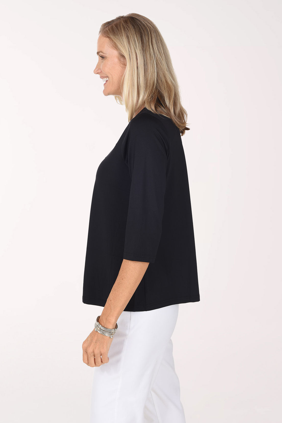 Side view of the black Crystal Bow 3/4 Sleeve Top showing the relaxed fit and 3/4-length sleeve.
