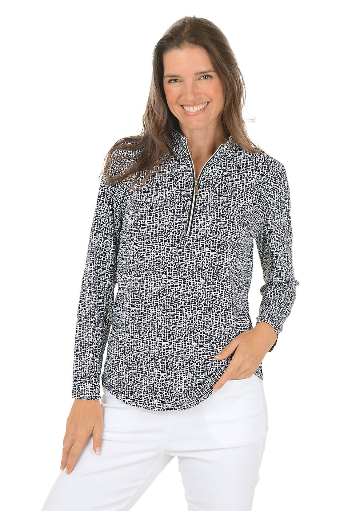 Woman wearing a black and white patterned pullover with a zipper on a white background