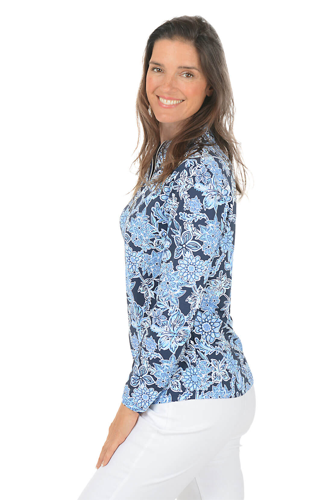 Woman wearing a blue floral patterned shirt on a white background