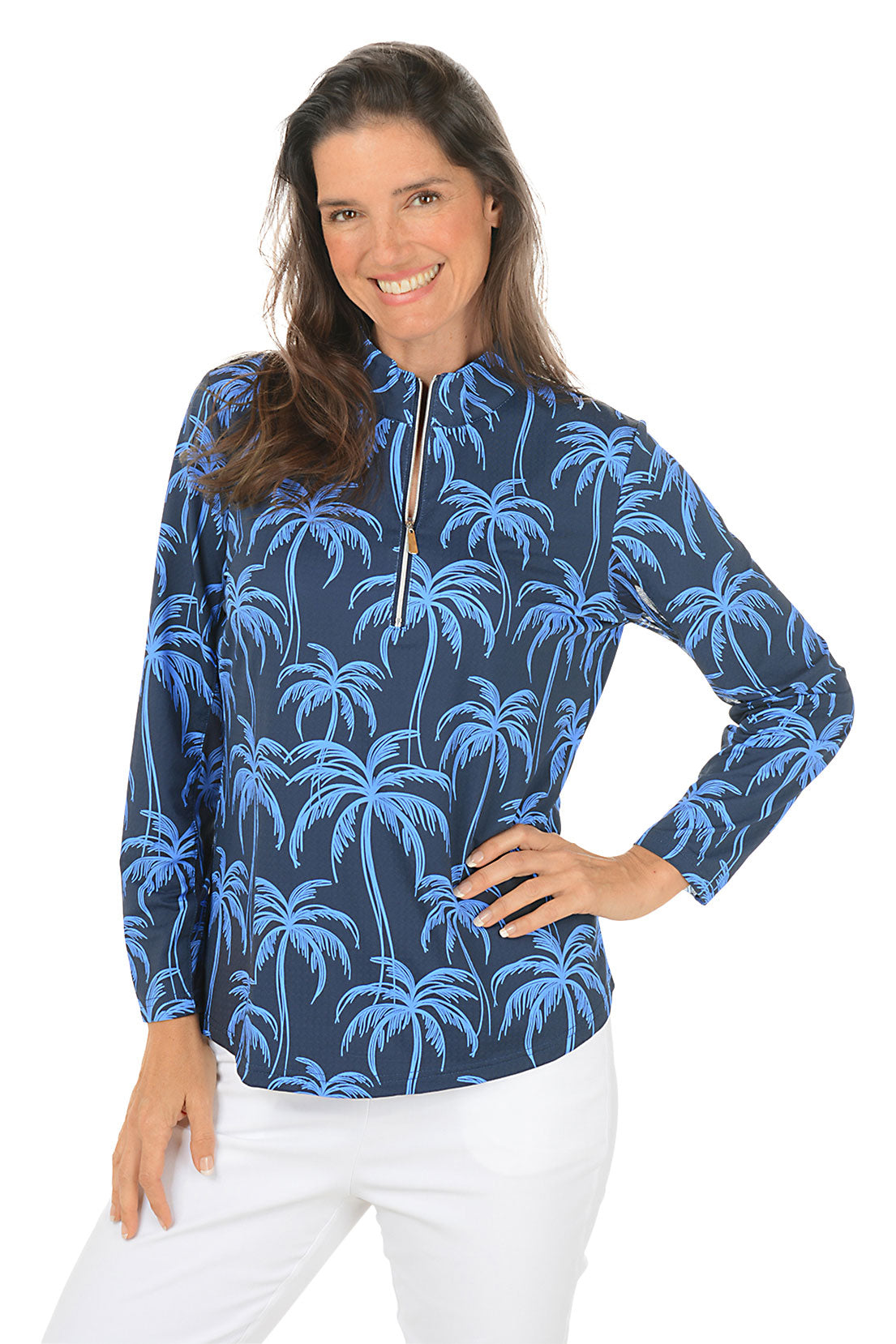 Woman wearing a blue palm tree patterned long-sleeve shirt on a white background
