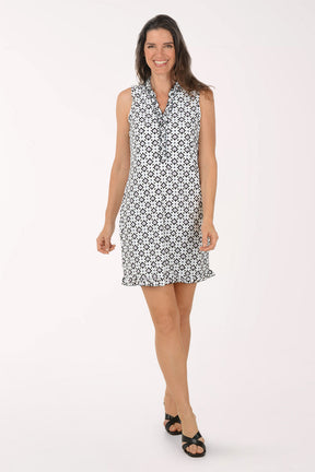 Woman wearing a black and white floral dress on a white background