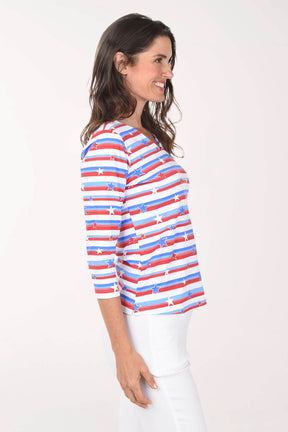 Woman wearing a red, white, and blue striped shirt on a white background