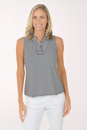 Woman wearing a black and white striped sleeveless top on a white background