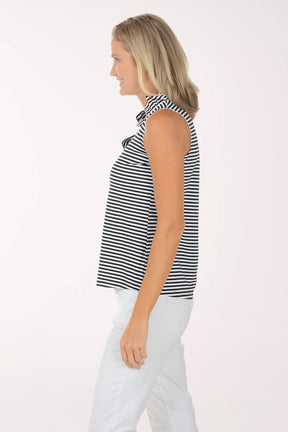 Woman wearing a black and white striped sleeveless top on a white background