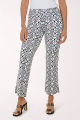 Patterned pants worn by a person on a white background