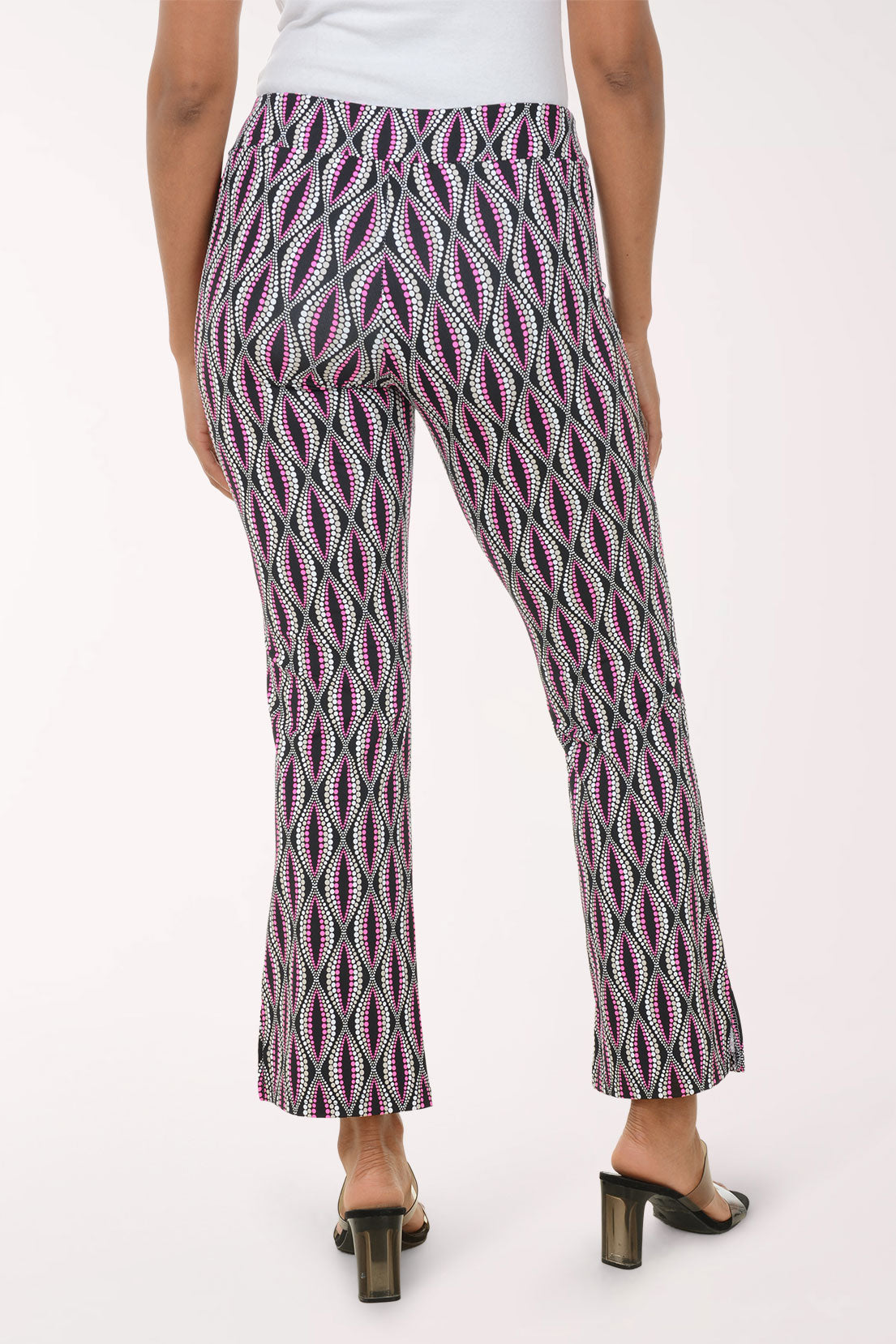 Patterned pants worn by a person on a white background
