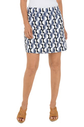 Person wearing a patterned skirt on a white background. Second front shot.