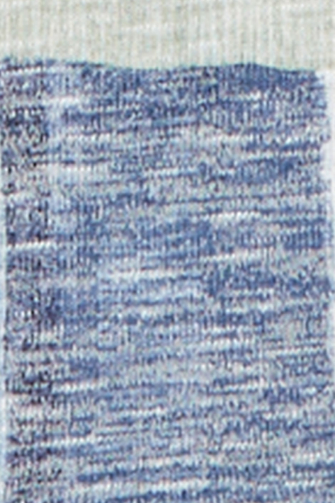 Close-up of one patch of the Ann Arbor Patchwork fabric showing a heathered blue knit texture.