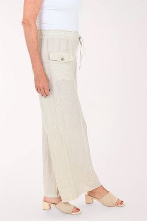 Woman wearing beige pants