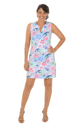Woman wearing a floral dress with a white background