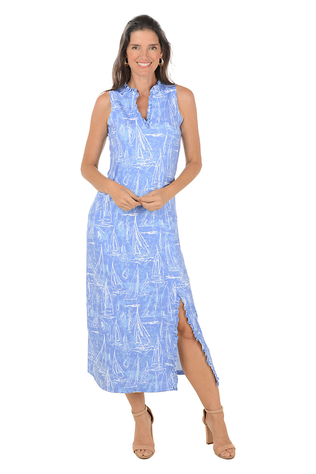 Woman wearing a blue patterned dress on a white background