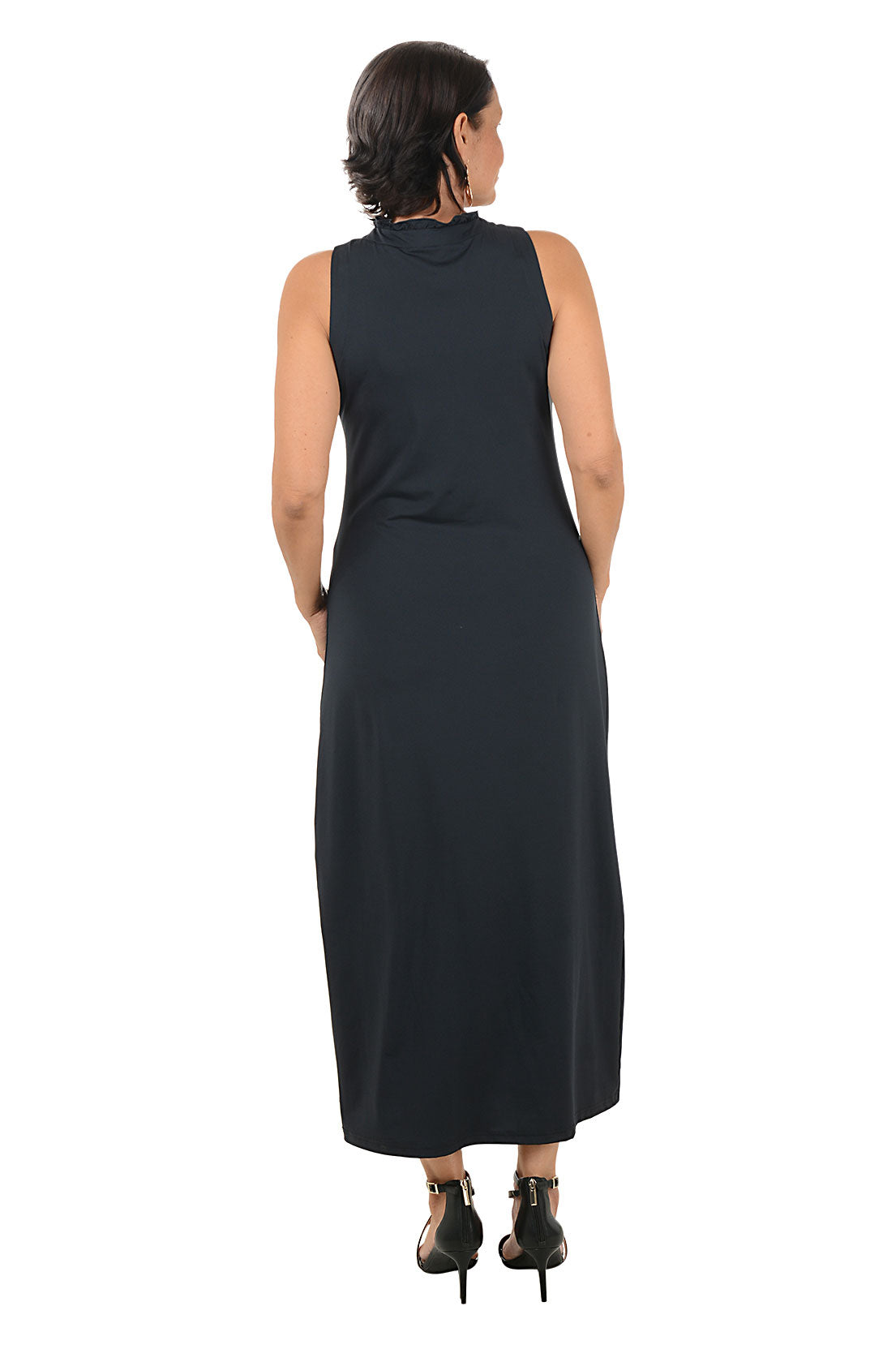 Woman wearing a black sleeveless dress on a white background