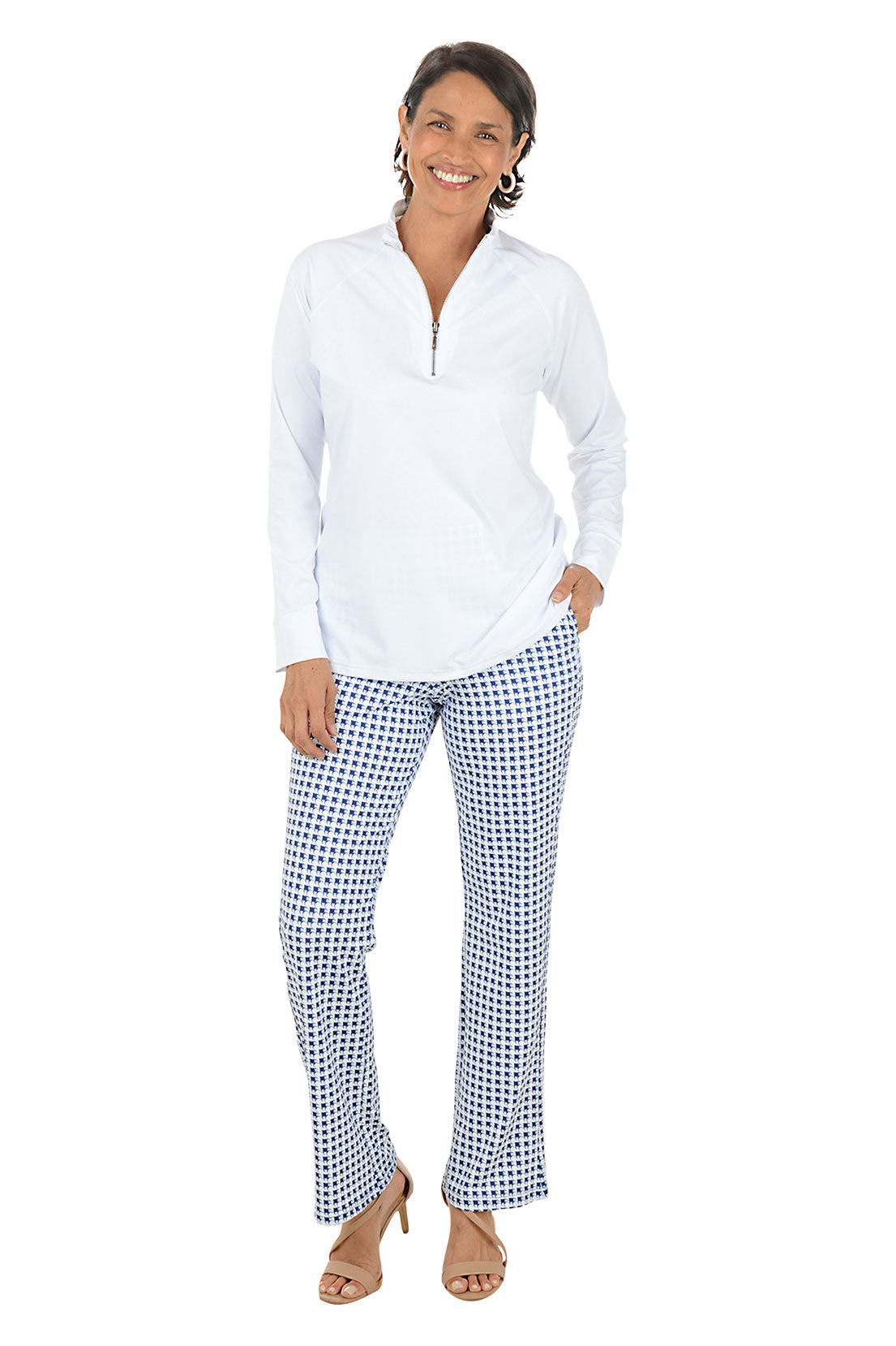 Woman wearing a white shirt and blue checkered pants on a white background