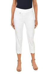 White pants worn by a person on a white background