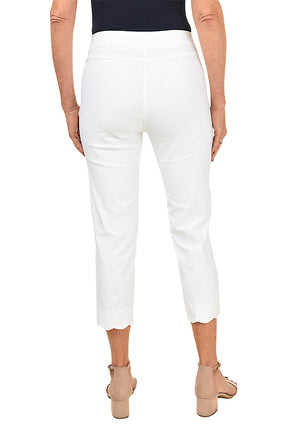 Person wearing white pants on a white background