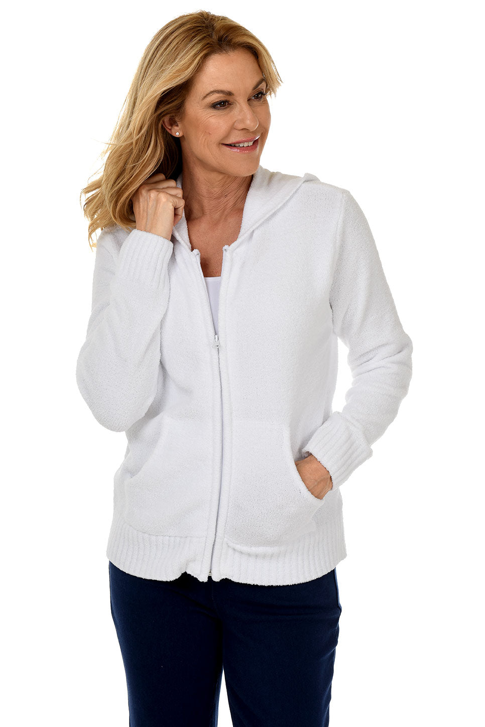 Woman wearing a white zip-up hoodie on a white background