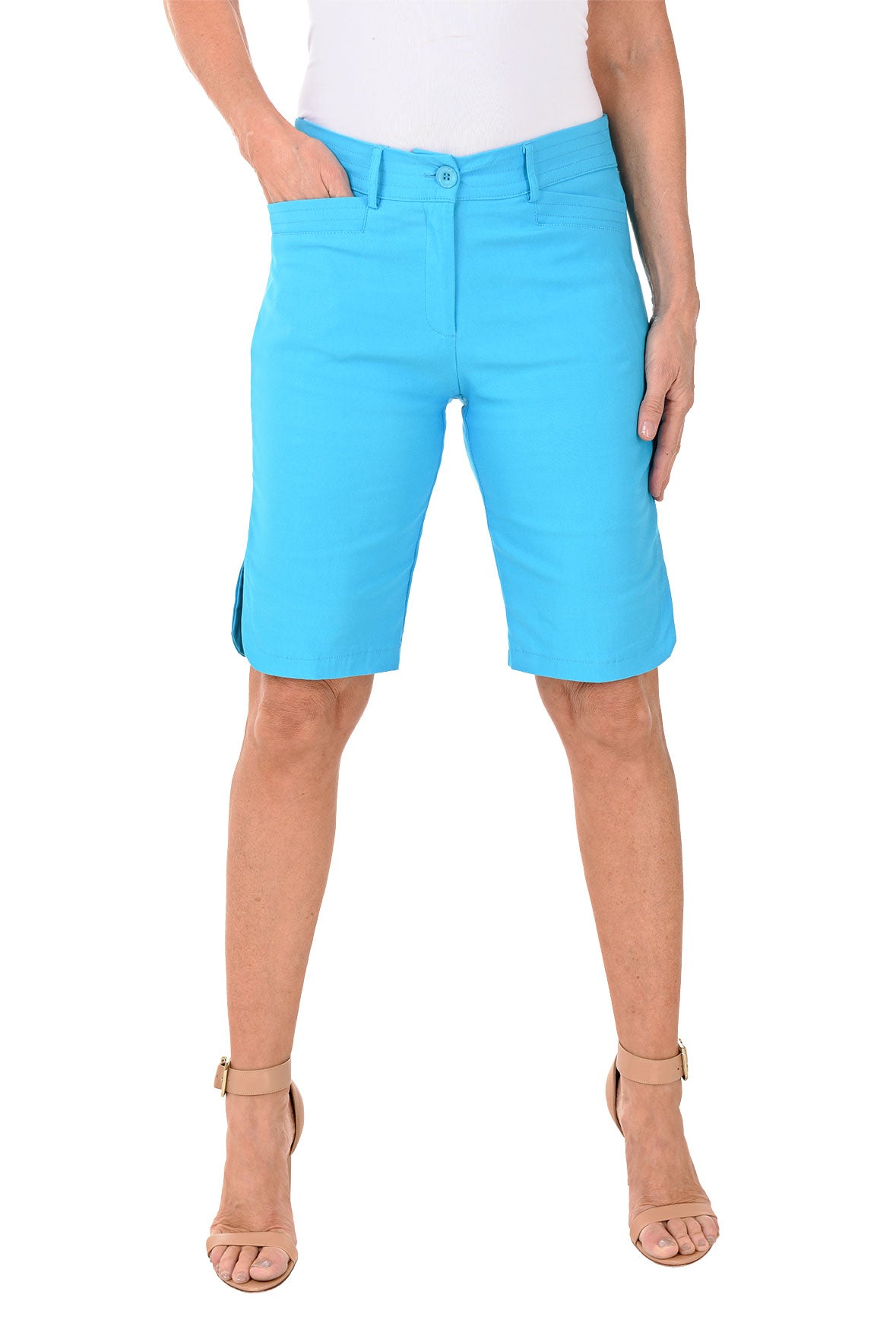 Person wearing bright blue shorts on a white background