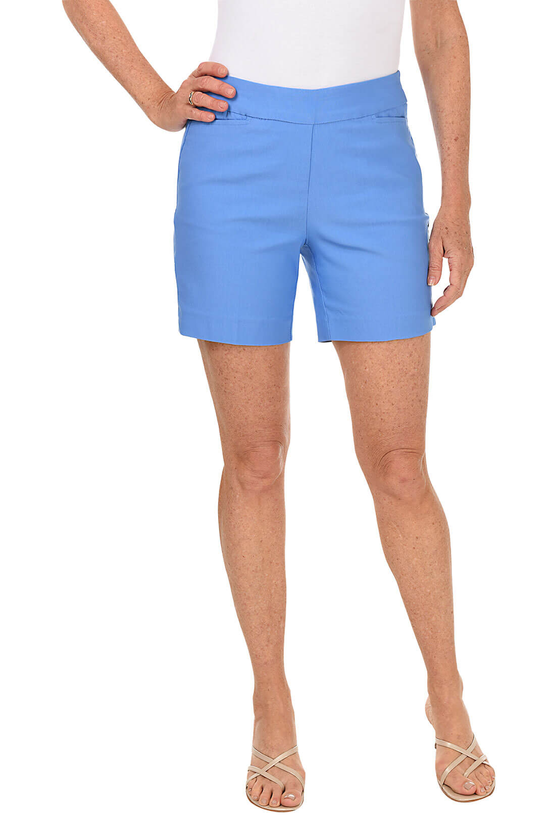 Person wearing periwinkle blue shorts on a white background