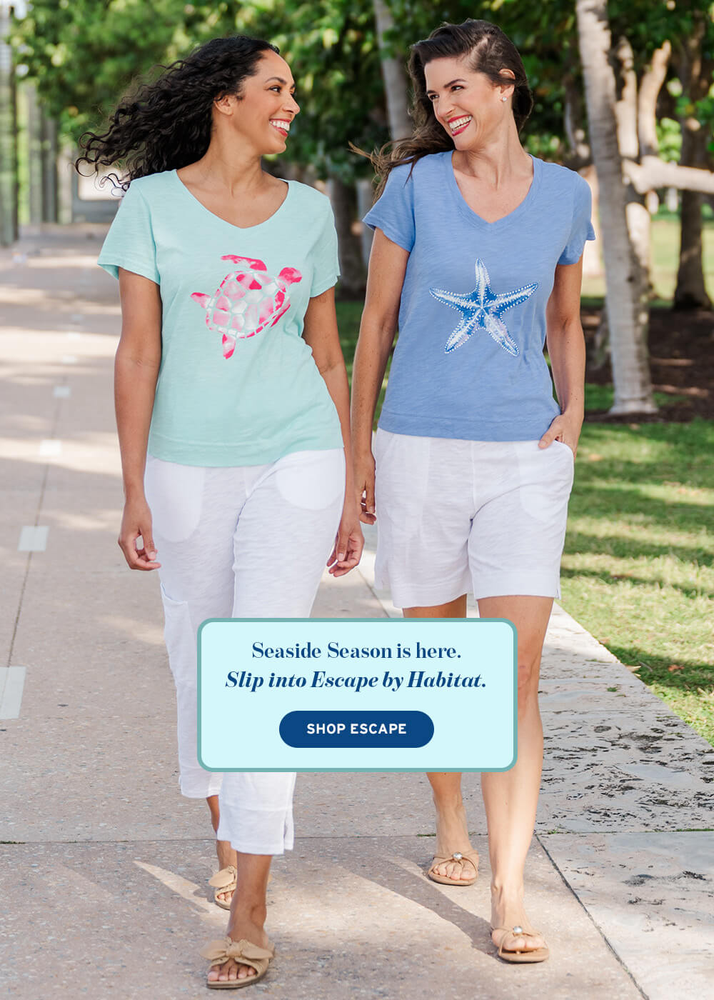 Two women walking in casual clothes with a banner that says Shop Escape by Habitat
