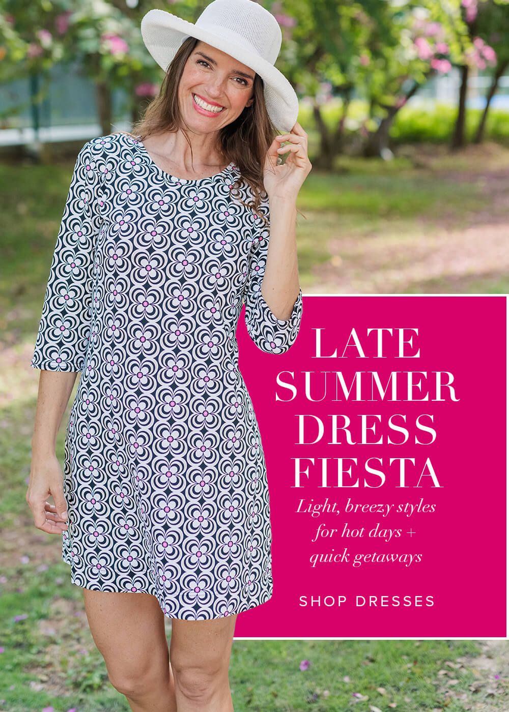 Our model wearing a patterned dress and white hat outdoors with promotional text overlay about our dresses.