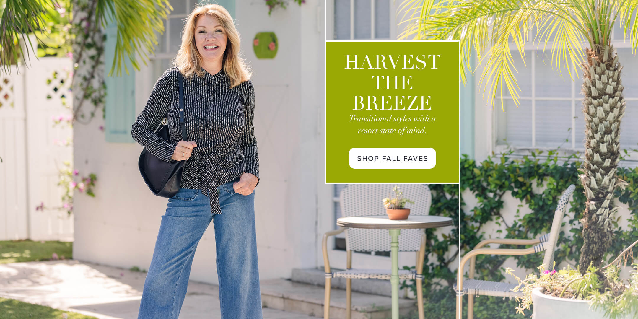 Woman standing outdoors with a promotional banner for 'Harvest the Breeze' clothing line.
