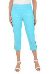 Person wearing light blue capri pants on a white background