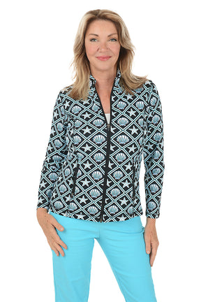 Woman wearing a patterned jacket with starfish and shell design on a white background. Second front shot.