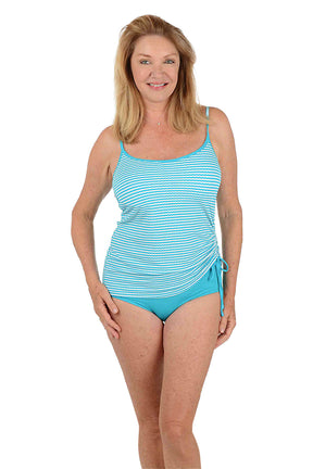 Woman wearing a blue and white striped swimsuit on a white background