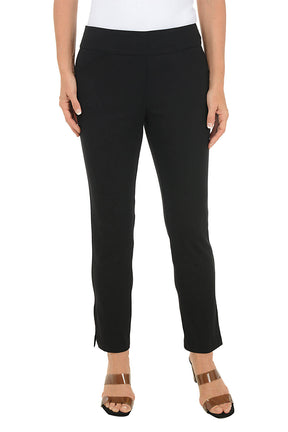 Black pants worn by a person on a white background