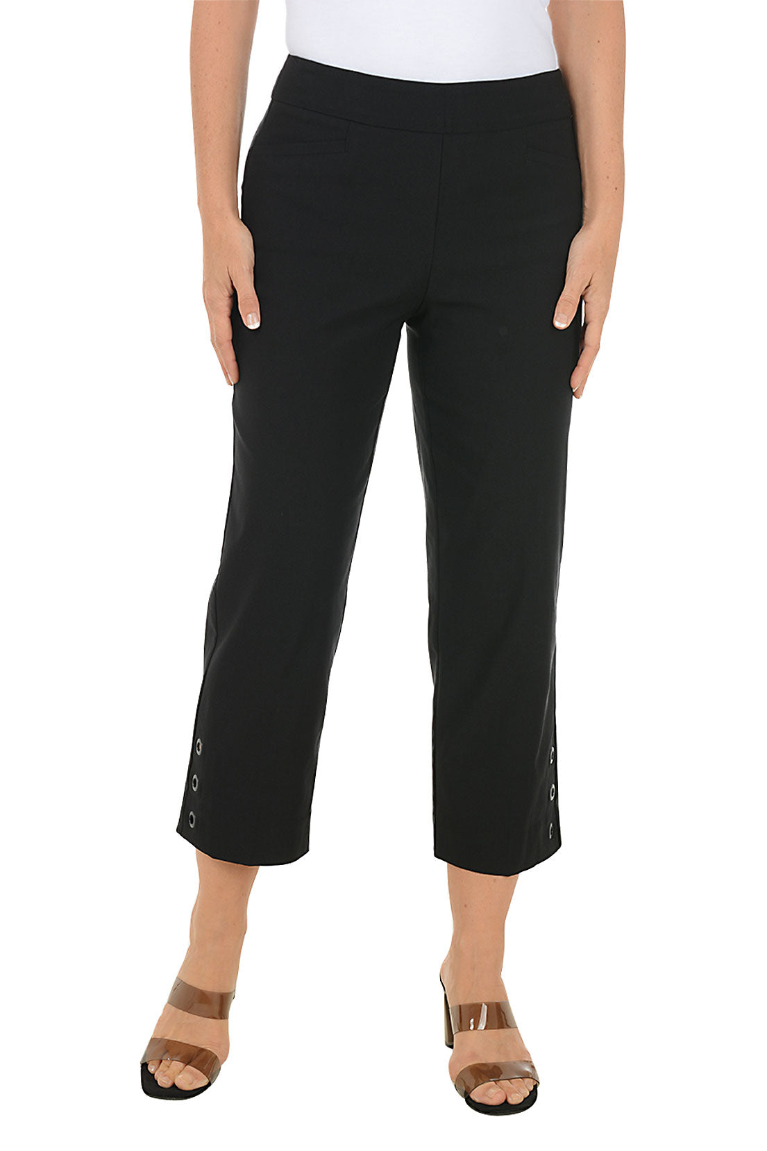 Black crop pants worn by a person on a white background.
