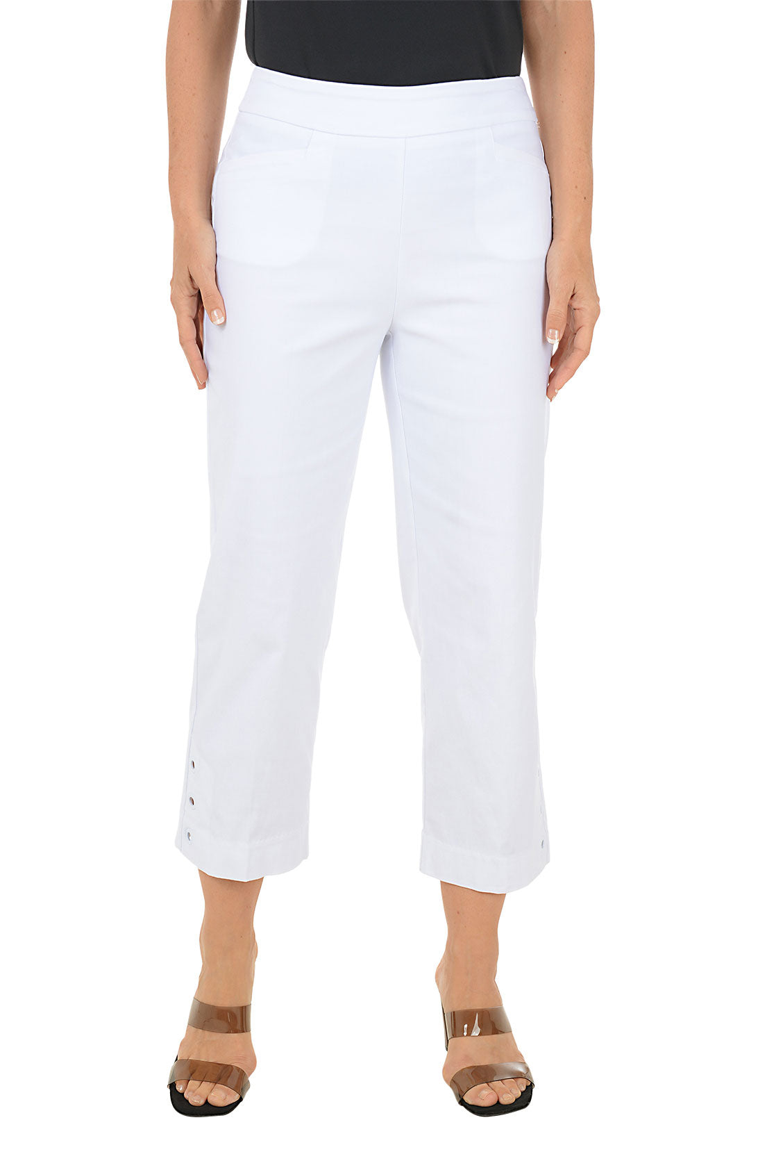 Person wearing white pants on a white background.