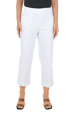 Person wearing white pants on a white background.