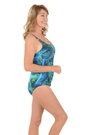 A woman wearing a blue and green one-piece swimsuit. Side shot.