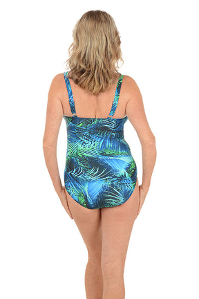 A woman wearing a blue and green one-piece swimsuit. Back shot.
