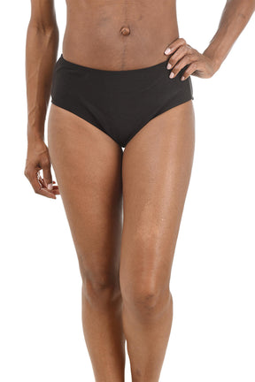 Person wearing black swim briefs on a white background.
