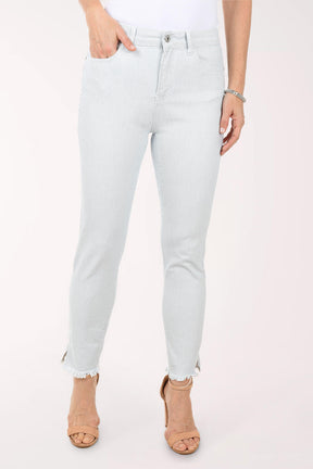 Light blue jeans worn by a person on a white background