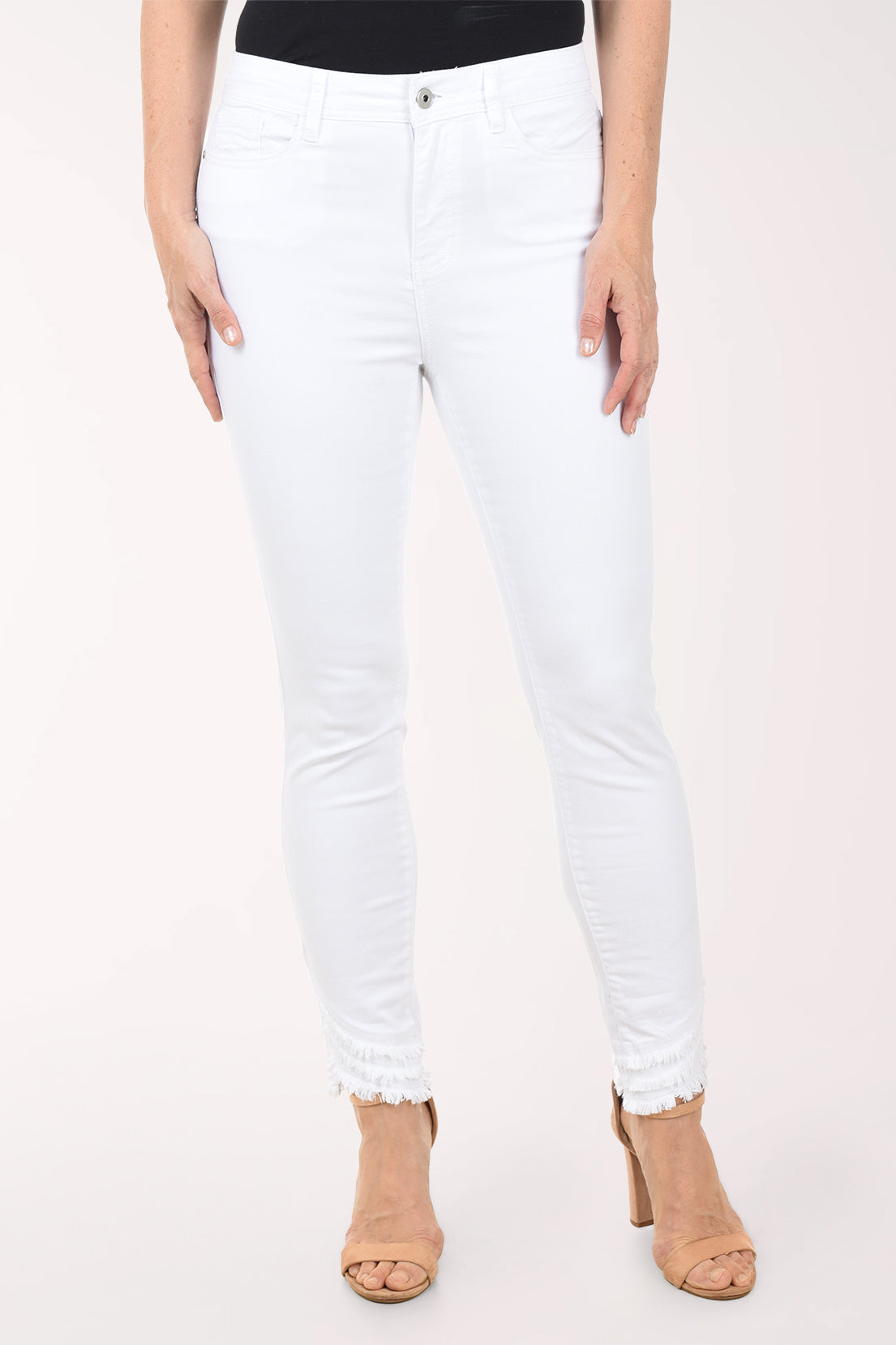 White jeans worn by a person on a white background