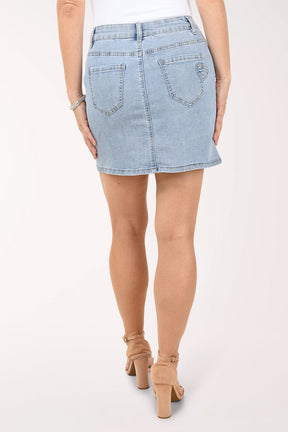 Light blue denim skirt worn by a person on a white background