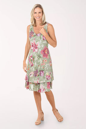 Woman wearing a floral dress on a white background