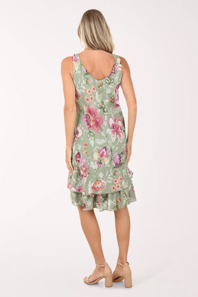 Woman wearing a floral dress on a white background