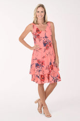 Woman wearing a floral dress on a white background