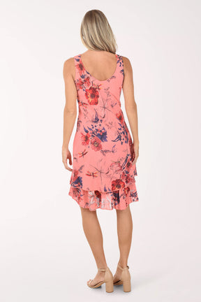 Woman wearing a floral dress on a white background