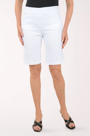 White shorts worn by a person on a white background