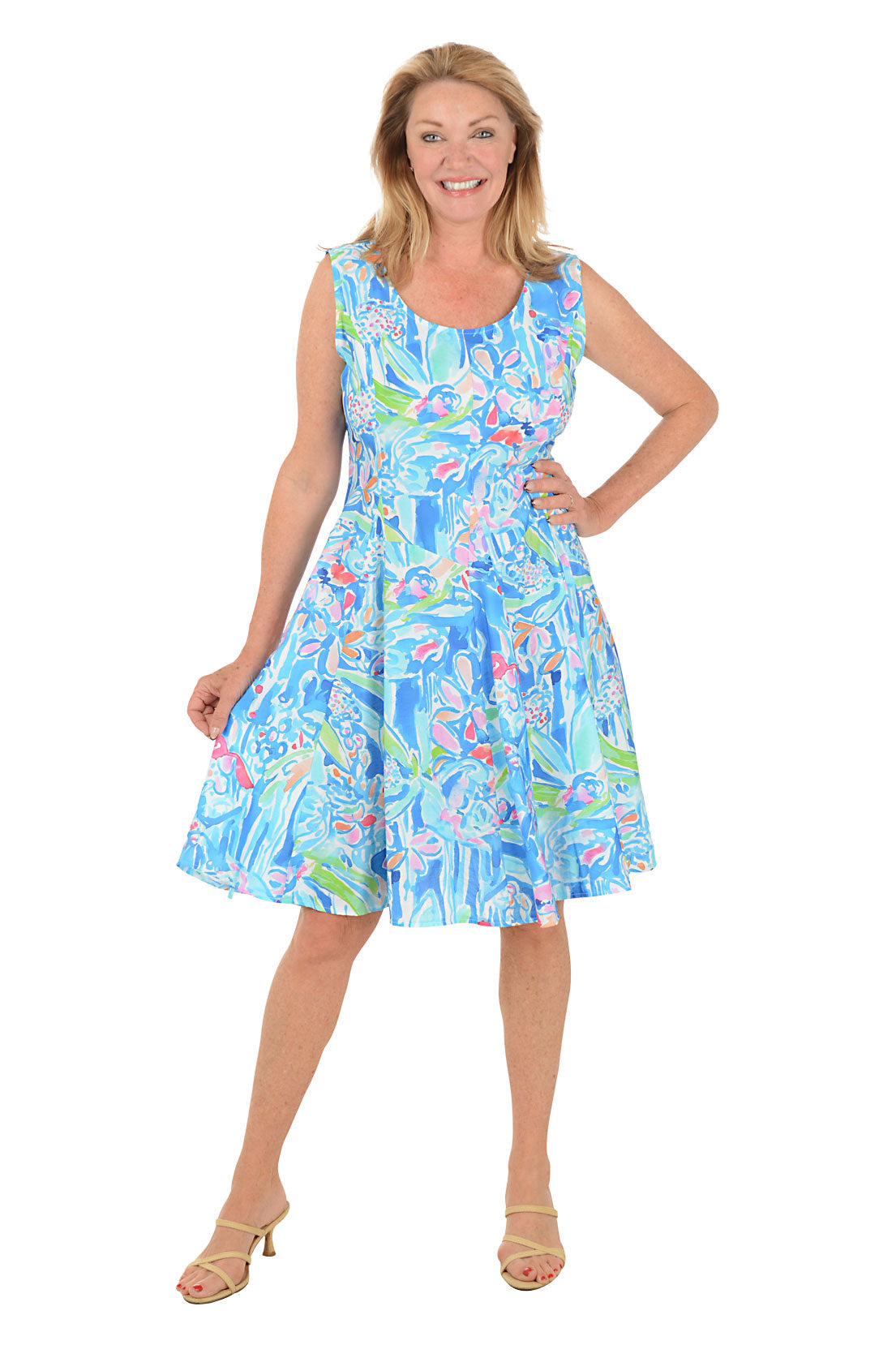 Woman wearing a colorful dress with a white background