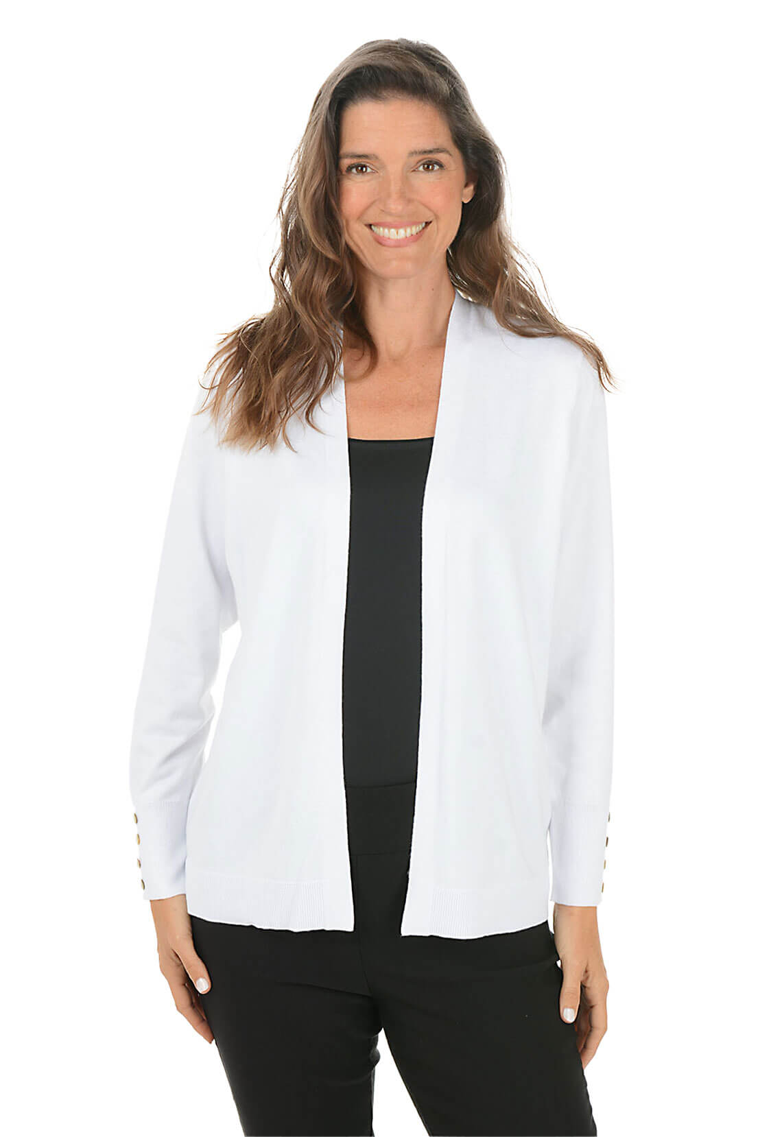 Woman wearing a white cardigan over a black top on a white background