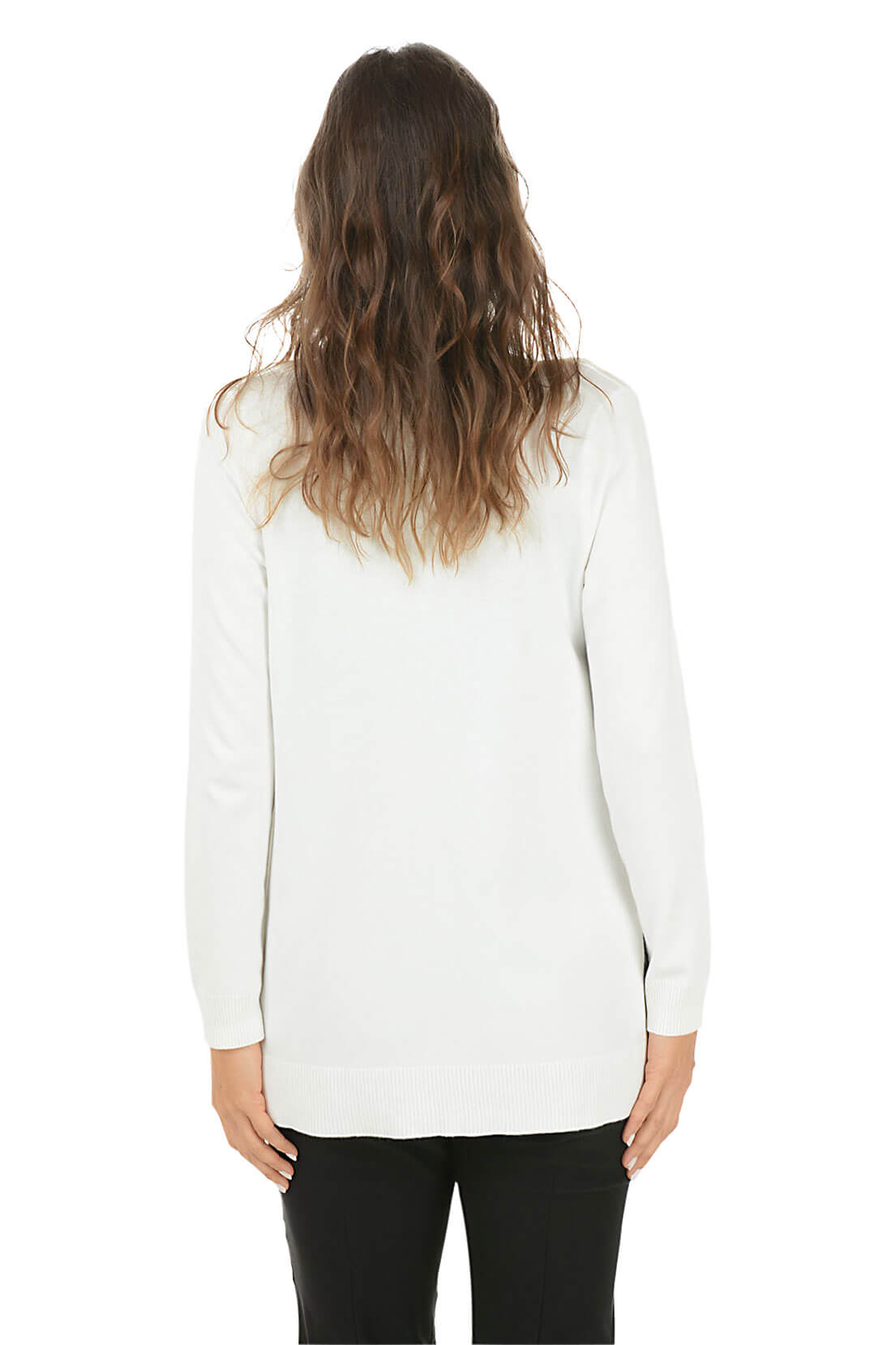 Person wearing a white long-sleeve top on a white background