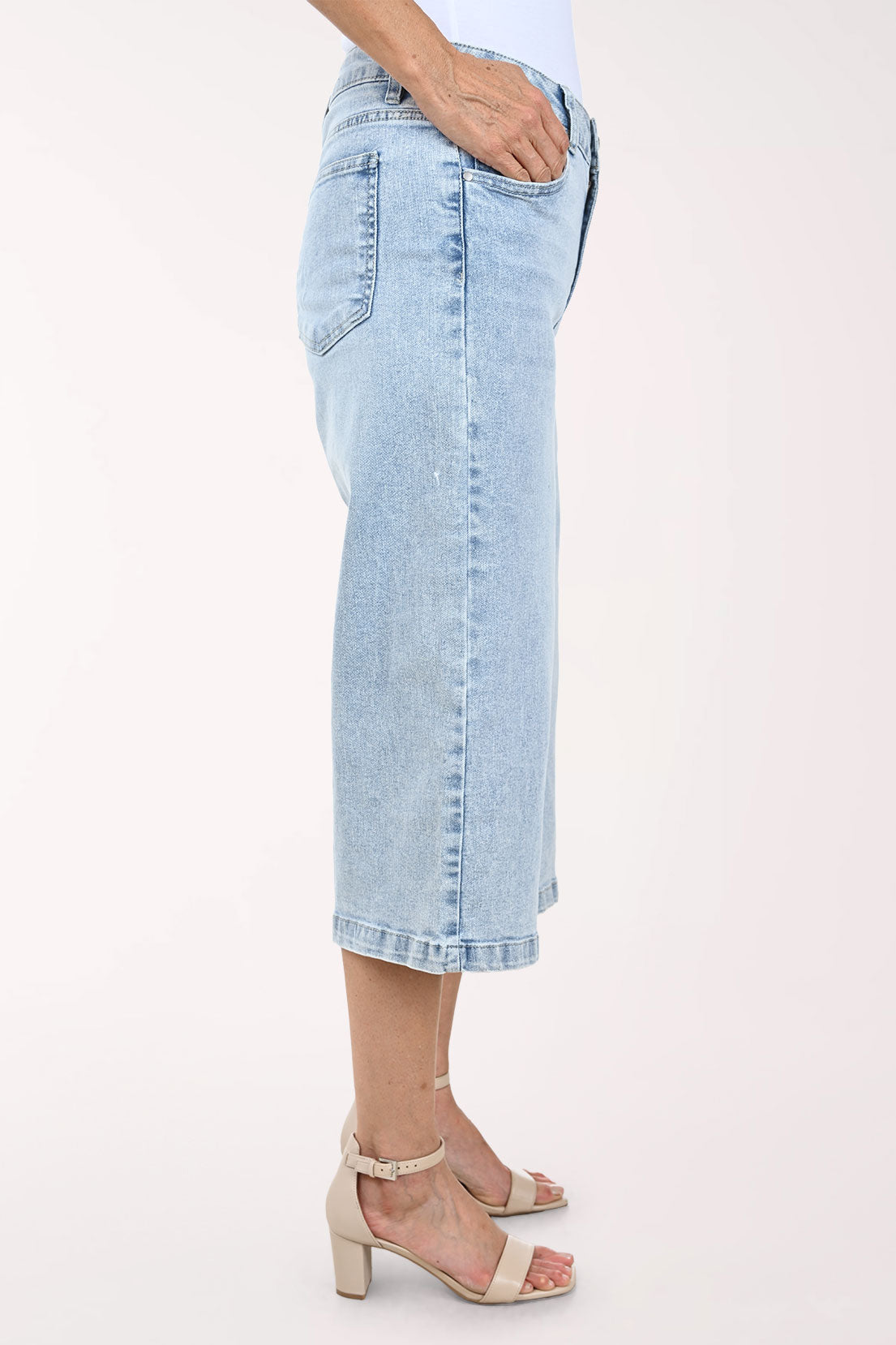 Woman wearing cropped denim pants