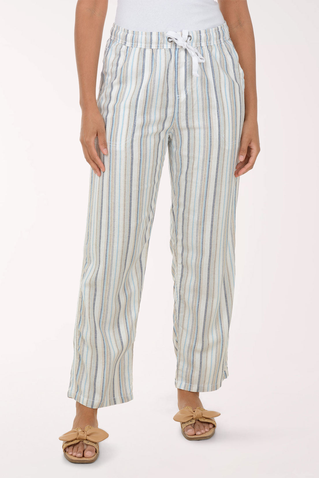 Person wearing striped pants on a white background