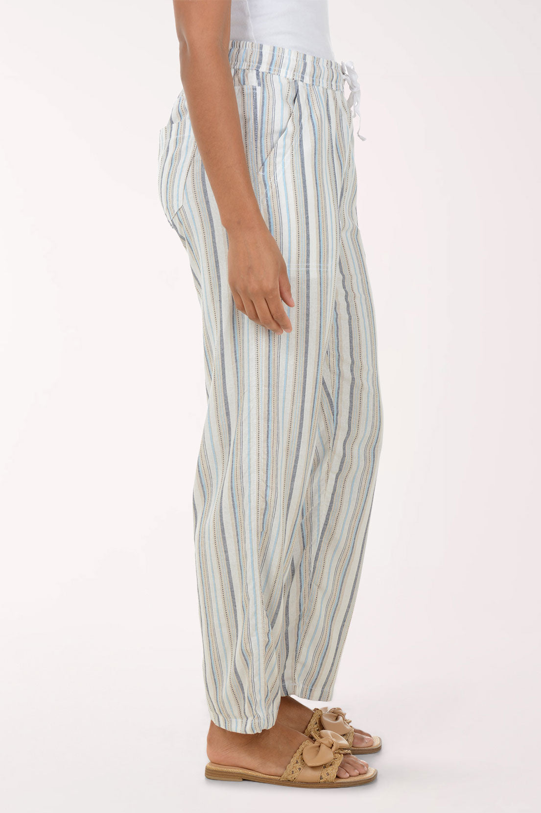 Person wearing striped pants on a white background